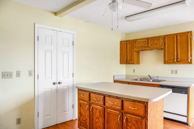 4170 Dot Rd, Springfield, TN 37172 - kitchen with white dishwasher, a sink, light wood-style floors, light countertops, and ceiling fan