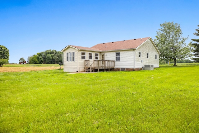 4170 Dot Rd, Springfield, TN 37172 - back of property featuring a wooden deck, a lawn, and cooling unit