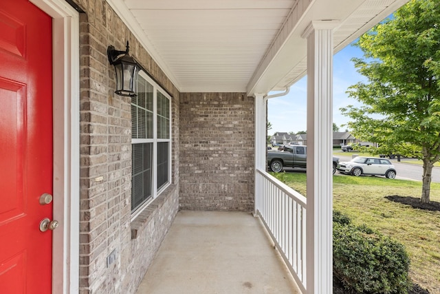 balcony featuring covered porch