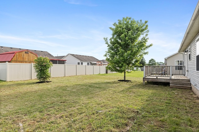 view of yard featuring a wooden deck