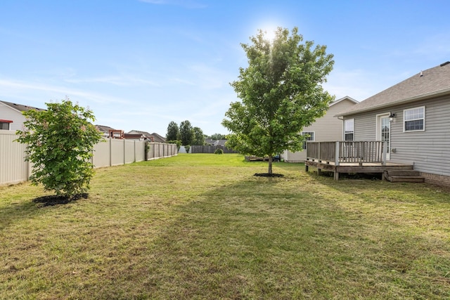 view of yard featuring a deck
