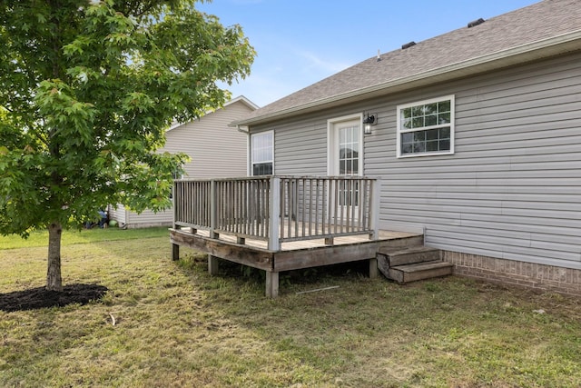 wooden terrace with a yard