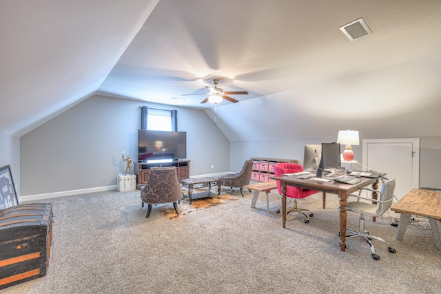 office area featuring a ceiling fan, carpet floors, lofted ceiling, and baseboards