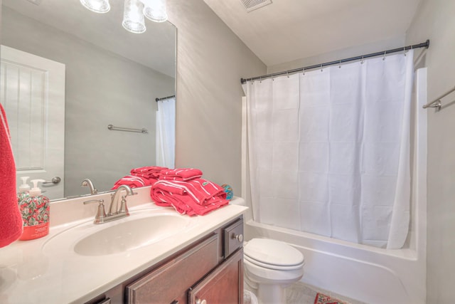 bathroom with vanity, toilet, and shower / bath combination with curtain