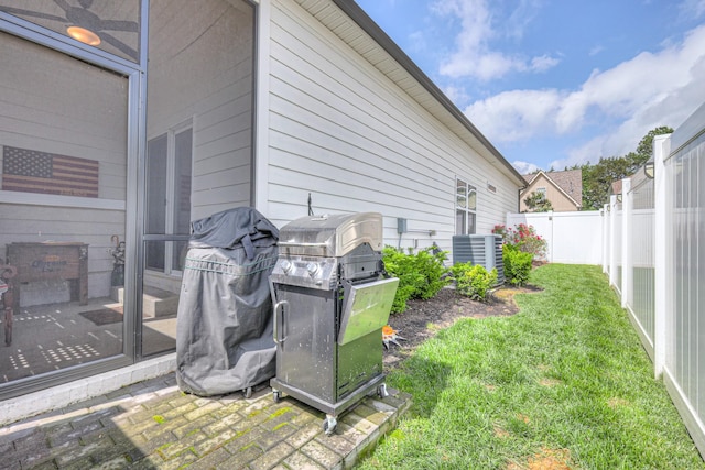 view of yard with central AC
