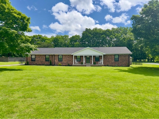 view of front of property with a porch and brick siding