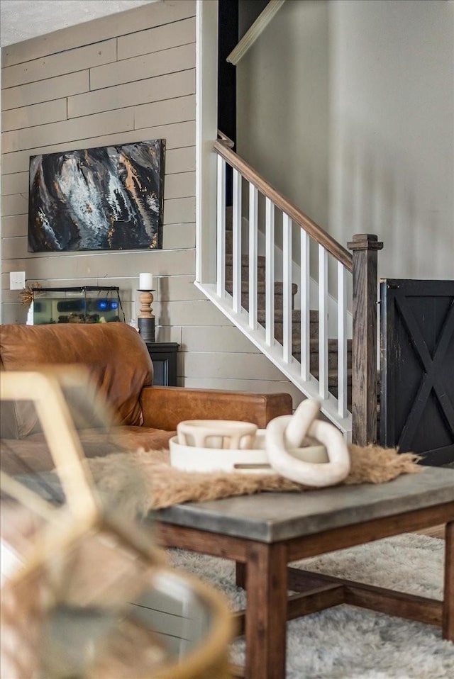 living area with stairs