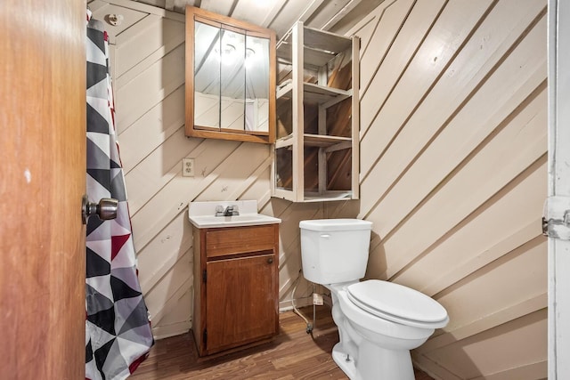 6966 Park Dr, Lyles, TN 37098 - bathroom with toilet, wood finished floors, vanity, and a shower with shower curtain
