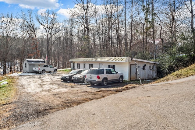 6966 Park Dr, Lyles, TN 37098 - view of front of house featuring metal roof