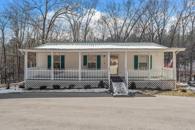 6966 Park Dr, Lyles, TN 37098 - single story home featuring a porch and metal roof