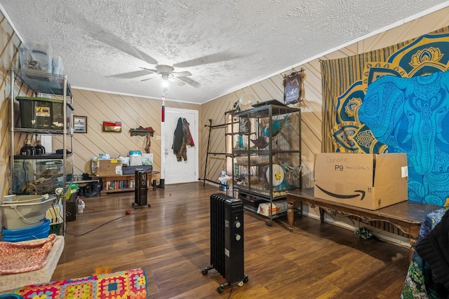 6966 Park Dr, Lyles, TN 37098 - interior space with a ceiling fan, wood finished floors, a textured ceiling, and wooden walls