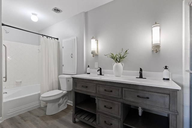1511 Bunker Hill Dr, Chattanooga, TN 37421 - bathroom featuring wood finished floors, toilet, shower / tub combo with curtain, and double vanity