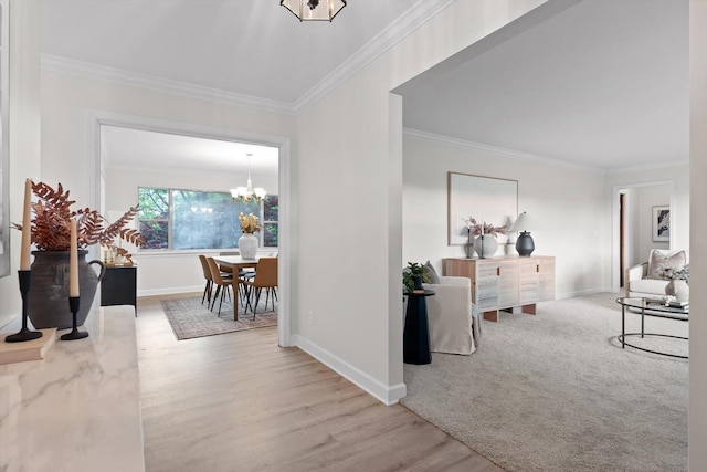 1511 Bunker Hill Dr, Chattanooga, TN 37421 - hall featuring crown molding, a chandelier, wood finished floors, and baseboards