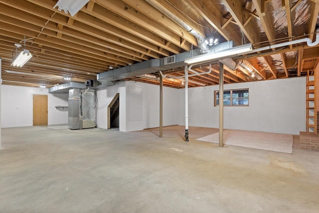 1511 Bunker Hill Dr, Chattanooga, TN 37421 - unfinished basement featuring heating unit and stairway