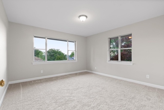 1511 Bunker Hill Dr, Chattanooga, TN 37421 - spare room with healthy amount of natural light, baseboards, and carpet