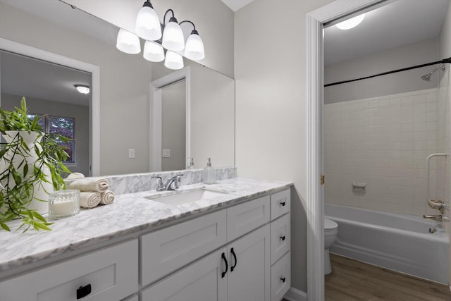 1511 Bunker Hill Dr, Chattanooga, TN 37421 - full bath featuring wood finished floors, vanity, toilet, and  shower combination