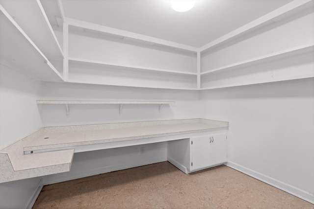 1511 Bunker Hill Dr, Chattanooga, TN 37421 - unfurnished office with baseboards, built in desk, and light floors