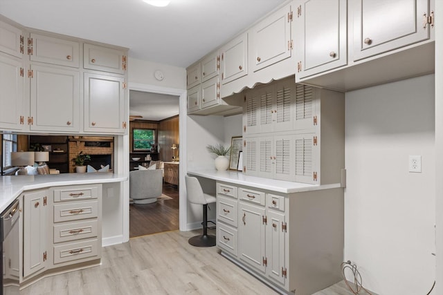 1511 Bunker Hill Dr, Chattanooga, TN 37421 - kitchen with light wood finished floors, light countertops, and dishwasher