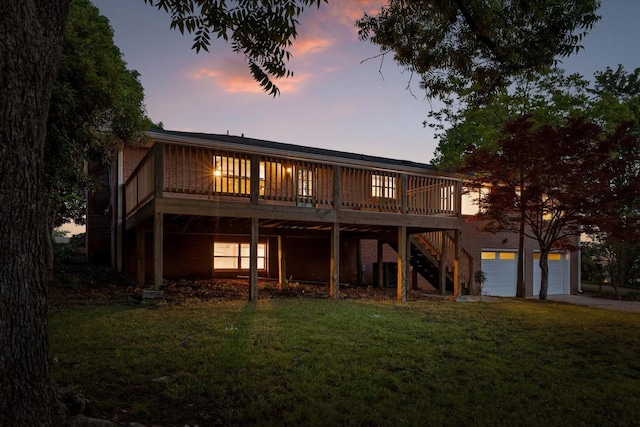 1511 Bunker Hill Dr, Chattanooga, TN 37421 - rear view of house featuring a yard, a garage, a deck, and concrete driveway