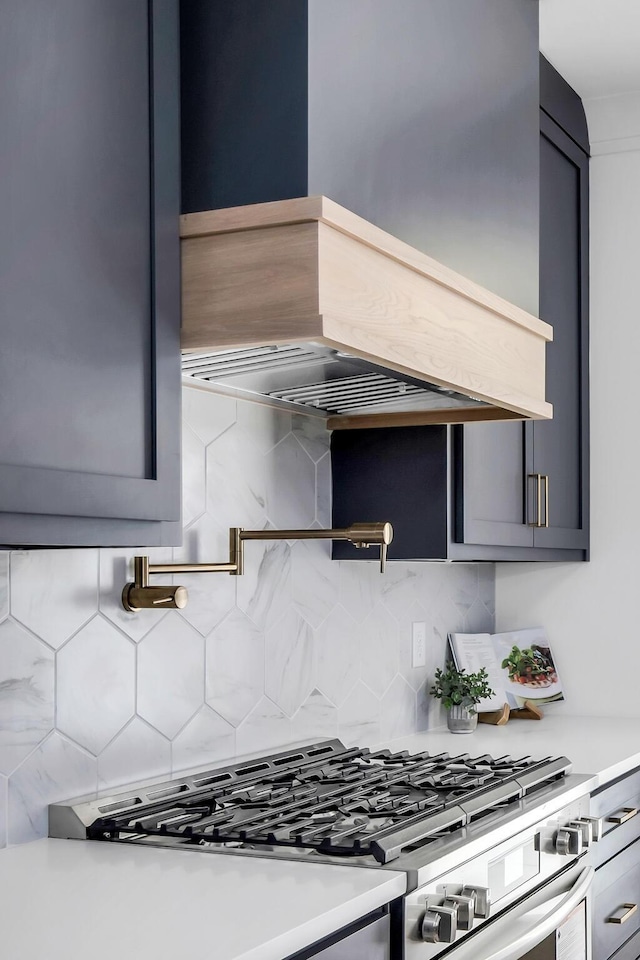 517B River Rouge Dr, Nashville, TN 37209 - kitchen featuring premium range hood, light countertops, decorative backsplash, and stainless steel gas stove