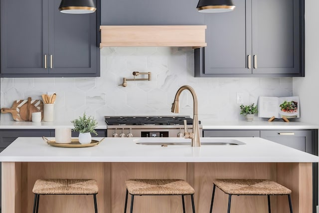 517B River Rouge Dr, Nashville, TN 37209 - kitchen with light countertops, a sink, and decorative backsplash
