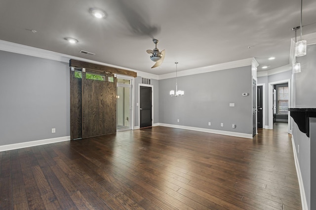 3100 W End Cir Unit 102, Nashville, TN 37203 - unfurnished living room featuring plenty of natural light, ornamental molding, a chandelier, hardwood / wood-style floors, and baseboards