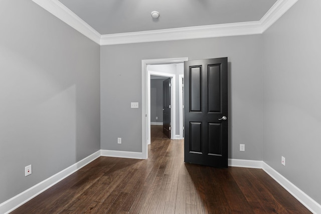 3100 W End Cir Unit 102, Nashville, TN 37203 - empty room featuring crown molding, dark wood-style floors, baseboards, and a smoke detector