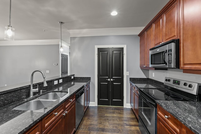 3100 W End Cir Unit 102, Nashville, TN 37203 - kitchen with stainless steel appliances, a sink, ornamental molding, dark wood-type flooring, and dark stone counters