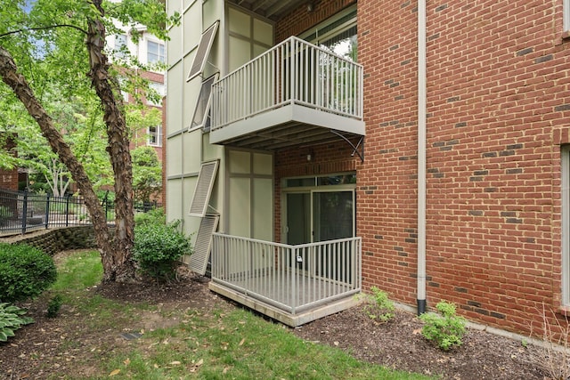 3100 W End Cir Unit 102, Nashville, TN 37203 - back of property featuring brick siding and a balcony