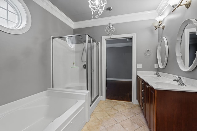 3100 W End Cir Unit 102, Nashville, TN 37203 - bathroom with crown molding, a stall shower, double vanity, a bath, and a chandelier