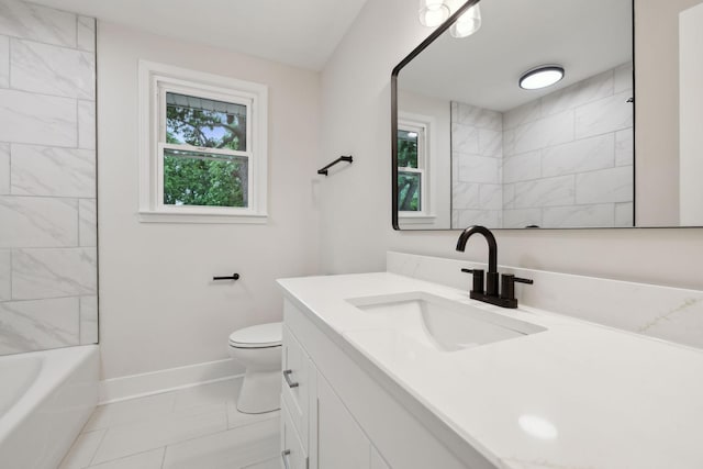 909 Plateau Pkwy, Nashville, TN 37205 - bathroom featuring vanity, toilet, baseboards, and washtub / shower combination