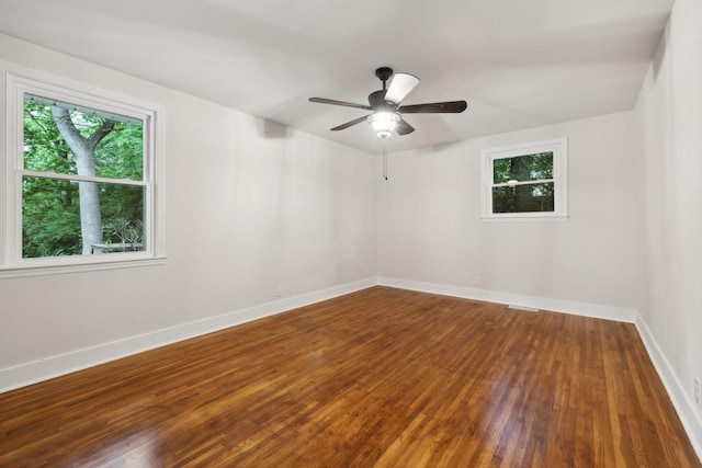 909 Plateau Pkwy, Nashville, TN 37205 - empty room featuring wood-type flooring, plenty of natural light, baseboards, and ceiling fan