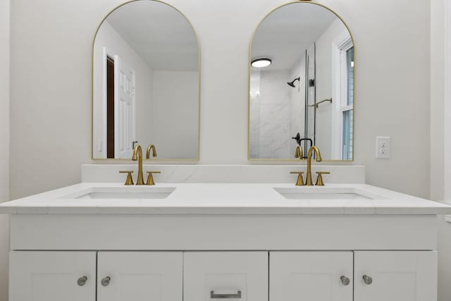 909 Plateau Pkwy, Nashville, TN 37205 - bathroom featuring double vanity and tiled shower
