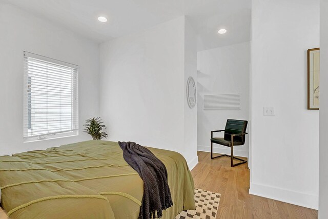 1056E 2nd Ave S, Nashville, TN 37210 - bedroom featuring baseboards, light wood-style flooring, and recessed lighting