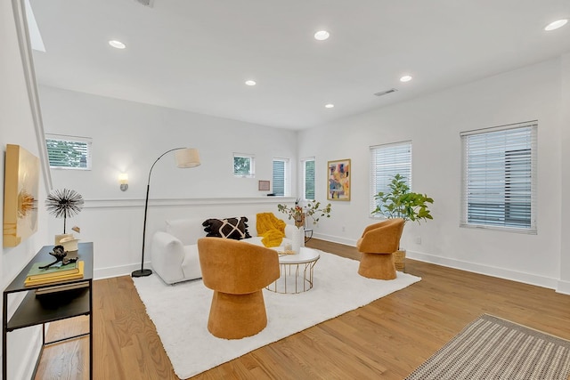 1056E 2nd Ave S, Nashville, TN 37210 - living area featuring wood finished floors, baseboards, and recessed lighting