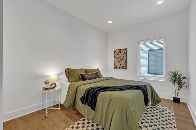 1056E 2nd Ave S, Nashville, TN 37210 - bedroom featuring wood finished floors, baseboards, and recessed lighting