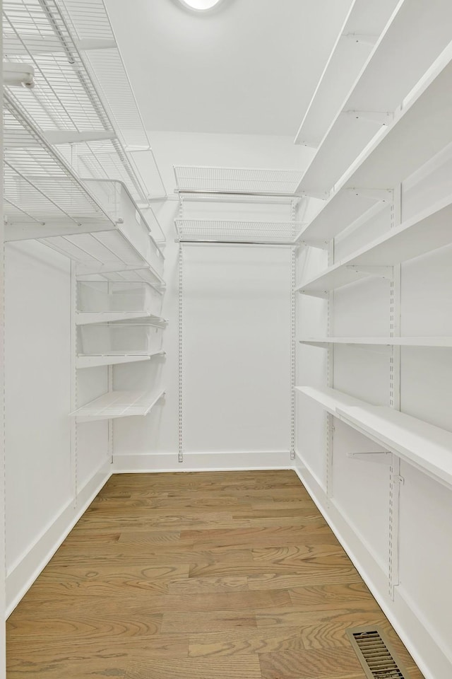 1056E 2nd Ave S, Nashville, TN 37210 - walk in closet featuring light wood-type flooring