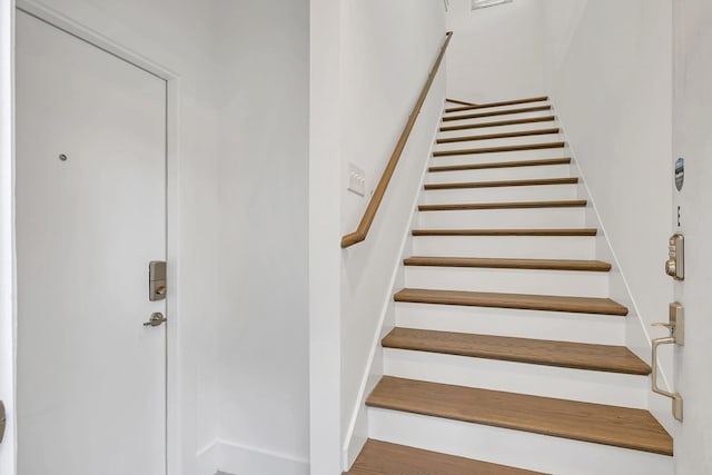 1056E 2nd Ave S, Nashville, TN 37210 - staircase featuring baseboards and wood finished floors