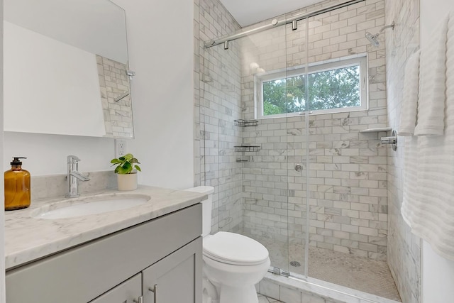 1056E 2nd Ave S, Nashville, TN 37210 - bathroom featuring a shower stall, vanity, and toilet