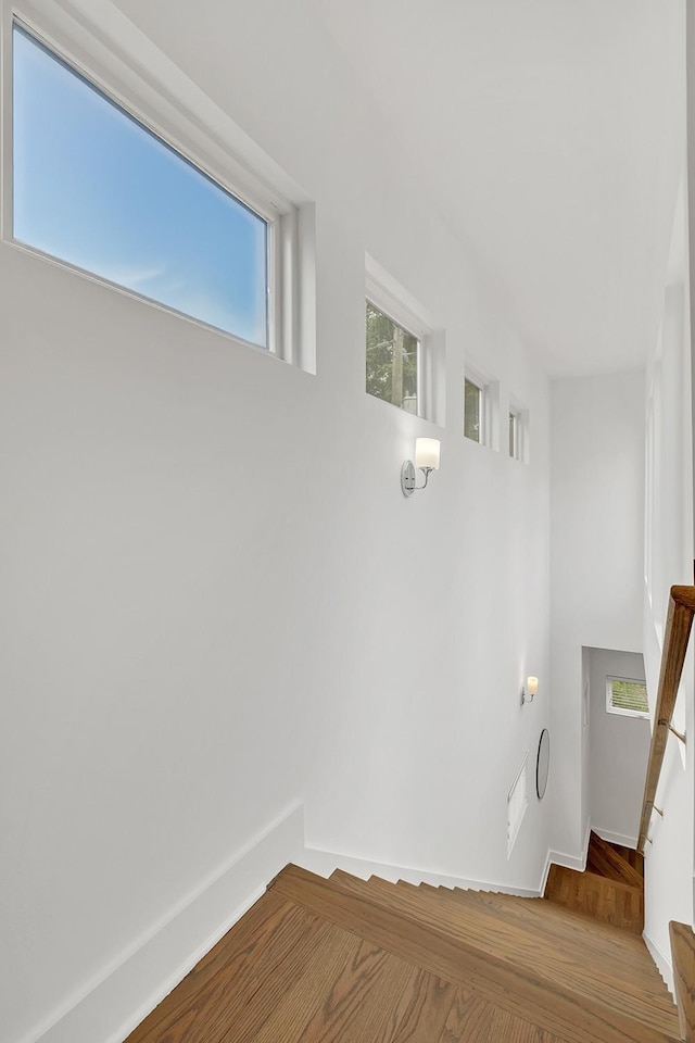 1056E 2nd Ave S, Nashville, TN 37210 - stairway featuring wood finished floors and baseboards