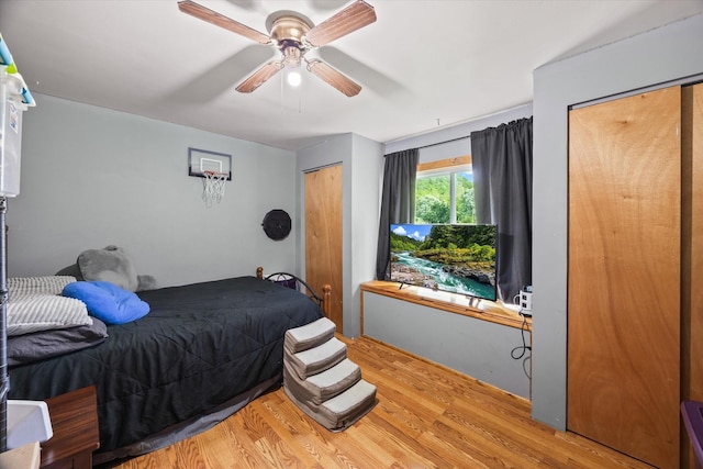 747 Hunting Creek Rd, Whitleyville, TN 38588 - bedroom with wood finished floors and ceiling fan