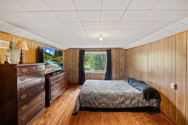 747 Hunting Creek Rd, Whitleyville, TN 38588 - bedroom with light wood-style floors and wood walls
