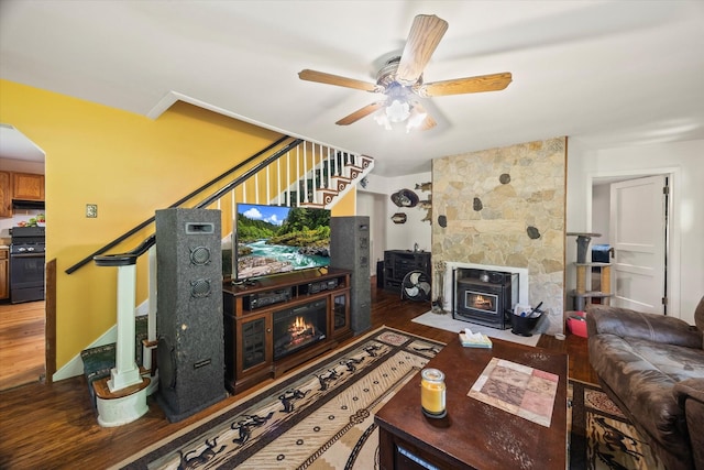 747 Hunting Creek Rd, Whitleyville, TN 38588 - living room featuring stairway, wood finished floors, a ceiling fan, and a large fireplace