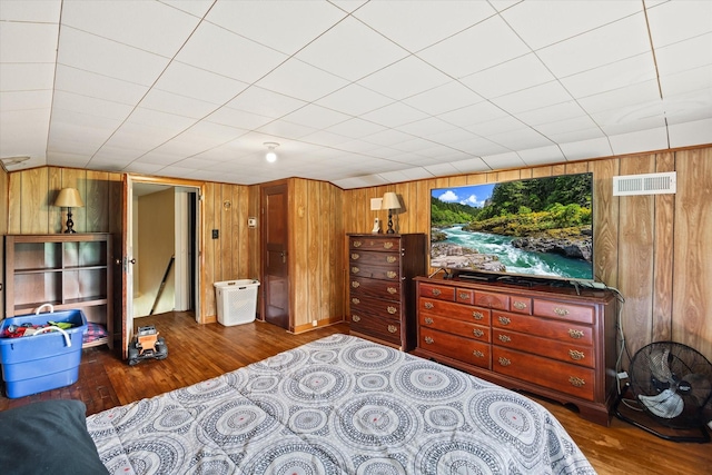 747 Hunting Creek Rd, Whitleyville, TN 38588 - bedroom featuring wood finished floors and wooden walls