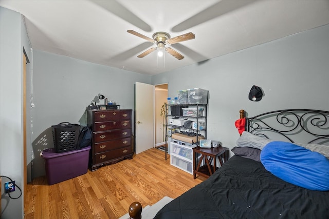 747 Hunting Creek Rd, Whitleyville, TN 38588 - bedroom with wood finished floors and a ceiling fan