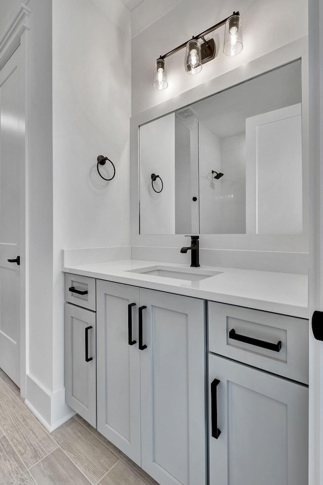 1018 Keeneland Dr, Gallatin, TN 37066 - full bathroom featuring vanity and baseboards