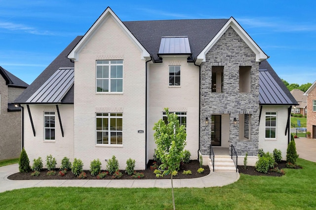 1018 Keeneland Dr, Gallatin, TN 37066 - view of front facade featuring a standing seam roof and metal roof
