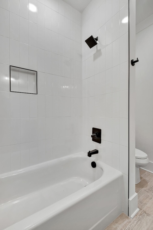1018 Keeneland Dr, Gallatin, TN 37066 - full bathroom with toilet, wood finished floors, and shower / bathtub combination