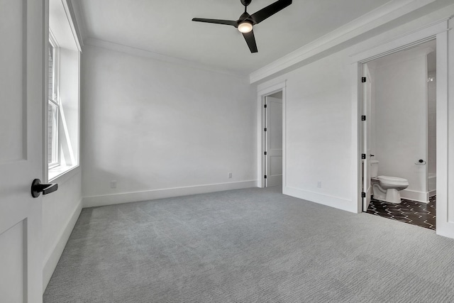 1018 Keeneland Dr, Gallatin, TN 37066 - unfurnished bedroom with carpet flooring, ornamental molding, baseboards, ensuite bathroom, and a ceiling fan
