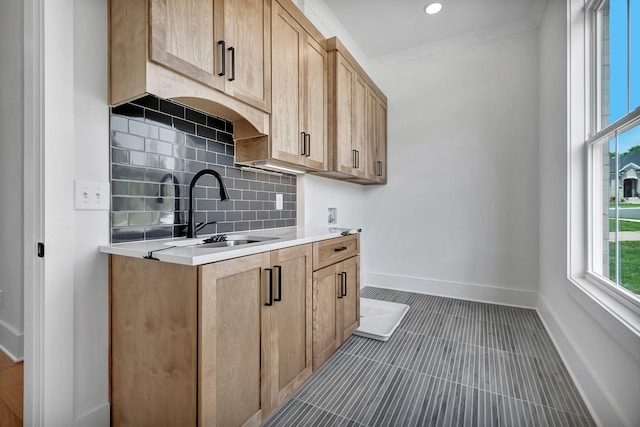 1018 Keeneland Dr, Gallatin, TN 37066 - kitchen with a sink, backsplash, light countertops, baseboards, and tile patterned floors